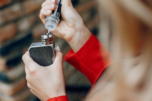 stylish young girl with vape